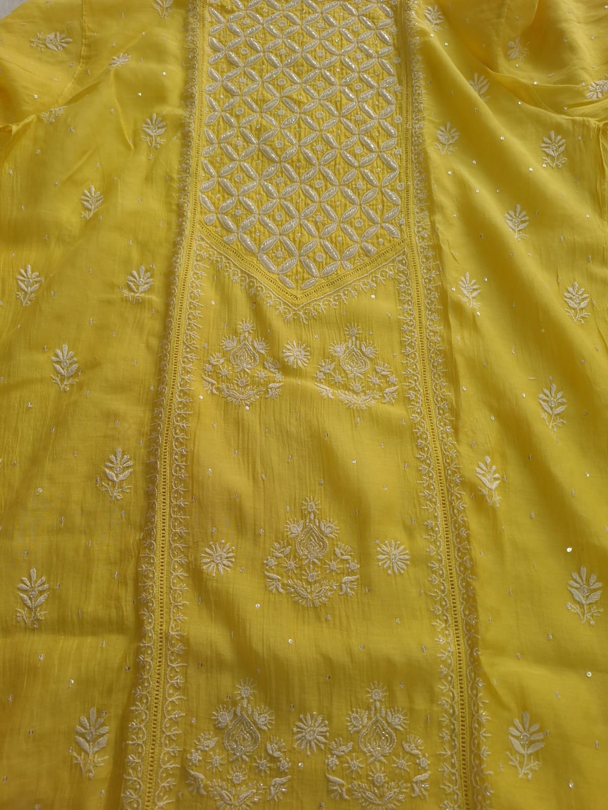 Mango yellow Mul Chanderi set with chikankari and heavy cutdana work