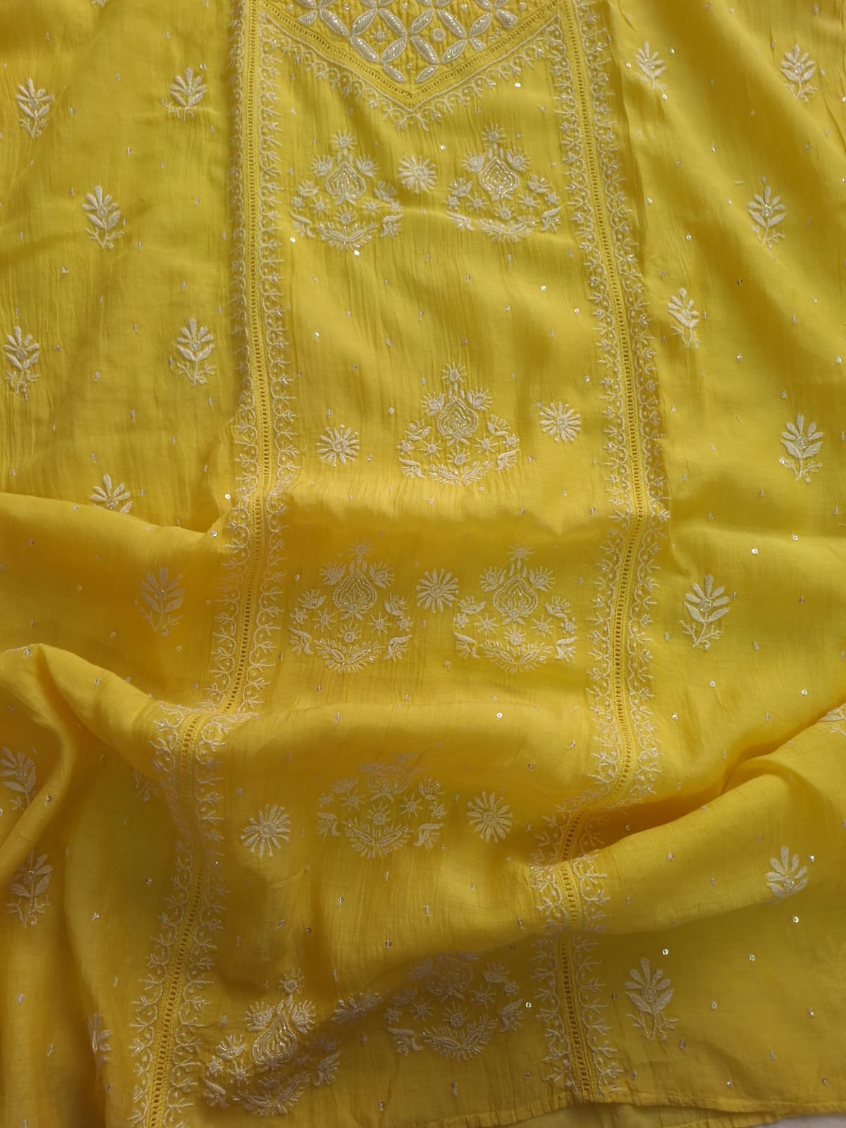 Mango yellow Mul Chanderi set with chikankari and heavy cutdana work