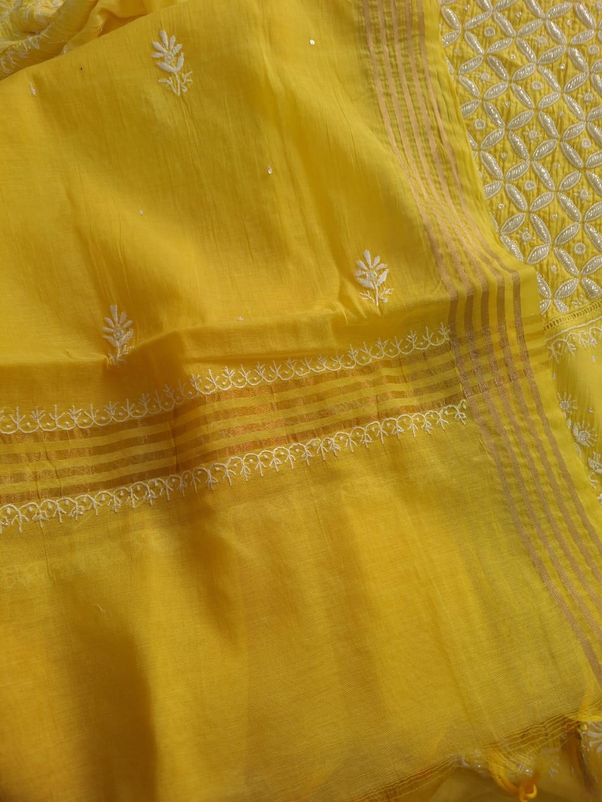 Mango yellow Mul Chanderi set with chikankari and heavy cutdana work