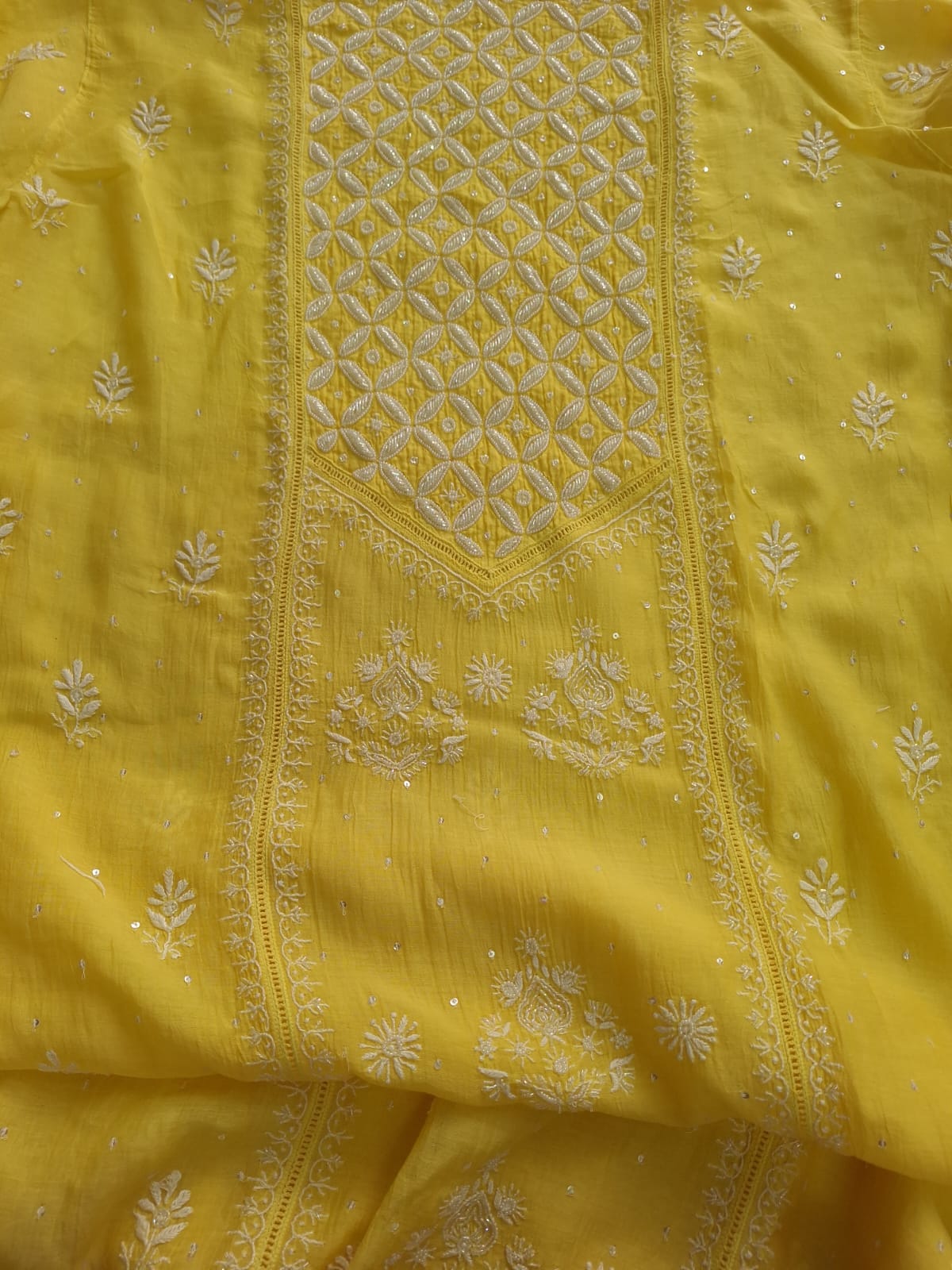 Mango yellow Mul Chanderi set with chikankari and heavy cutdana work