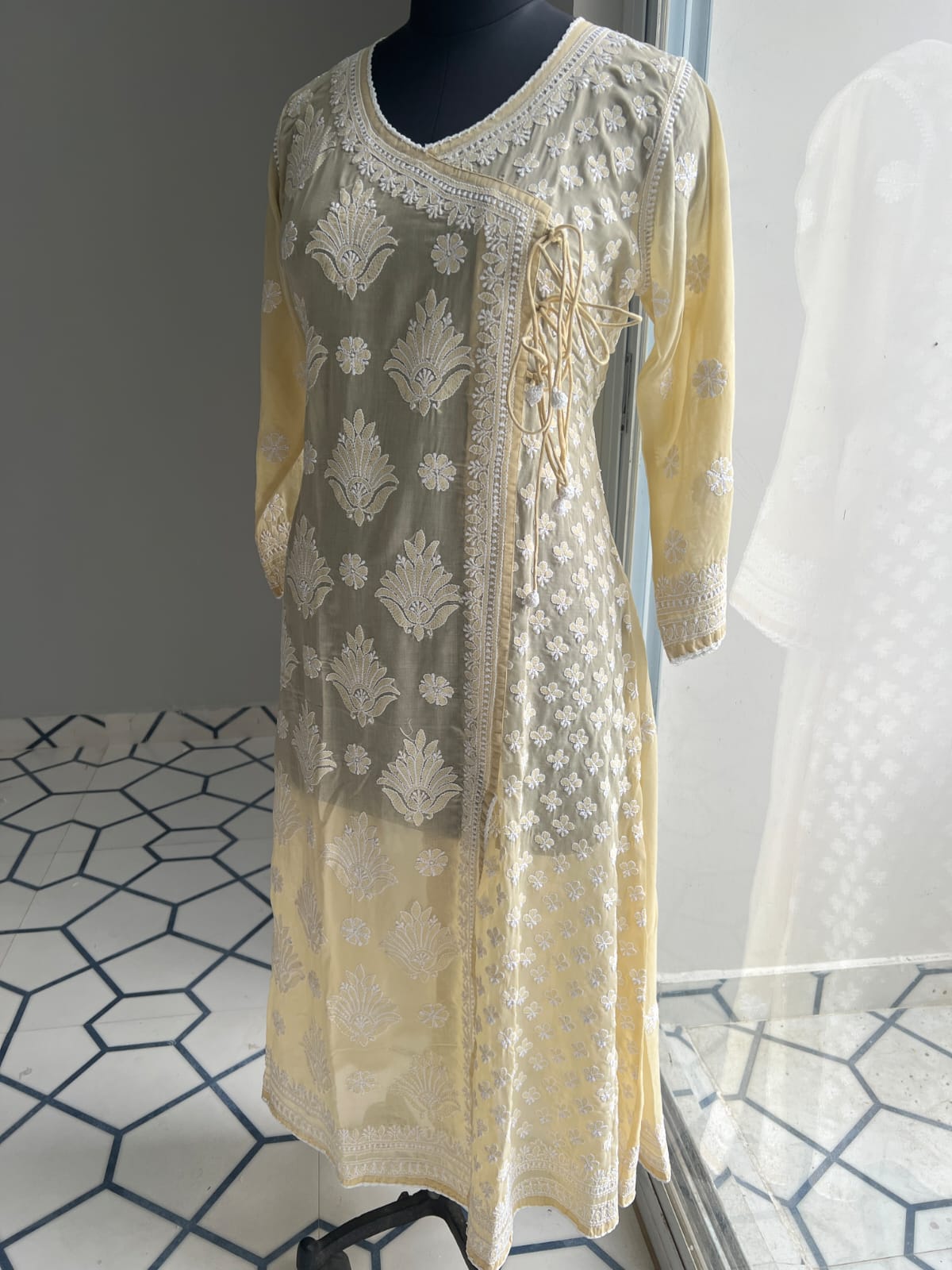 Beige A line Angarkha Style Kurti with chikankari and tessels