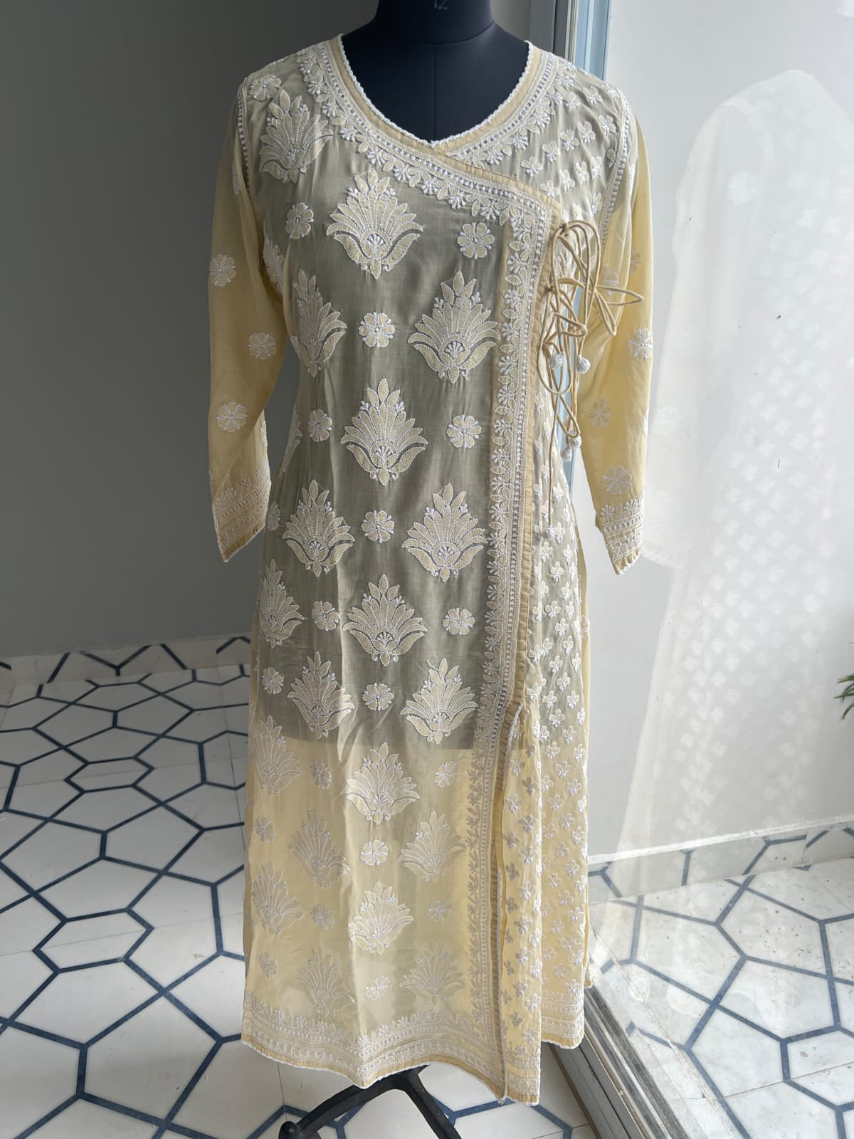 Beige A line Angarkha Style Kurti with chikankari and tessels