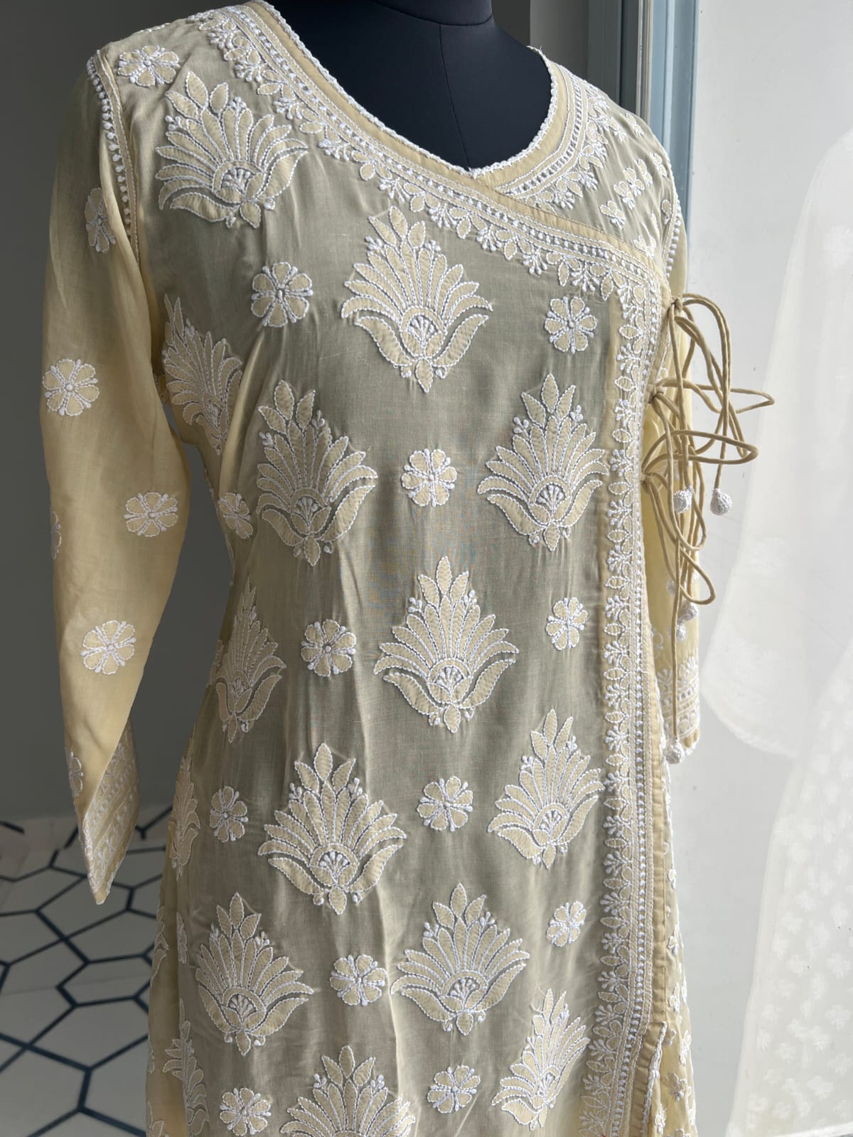 Beige A line Angarkha Style Kurti with chikankari and tessels