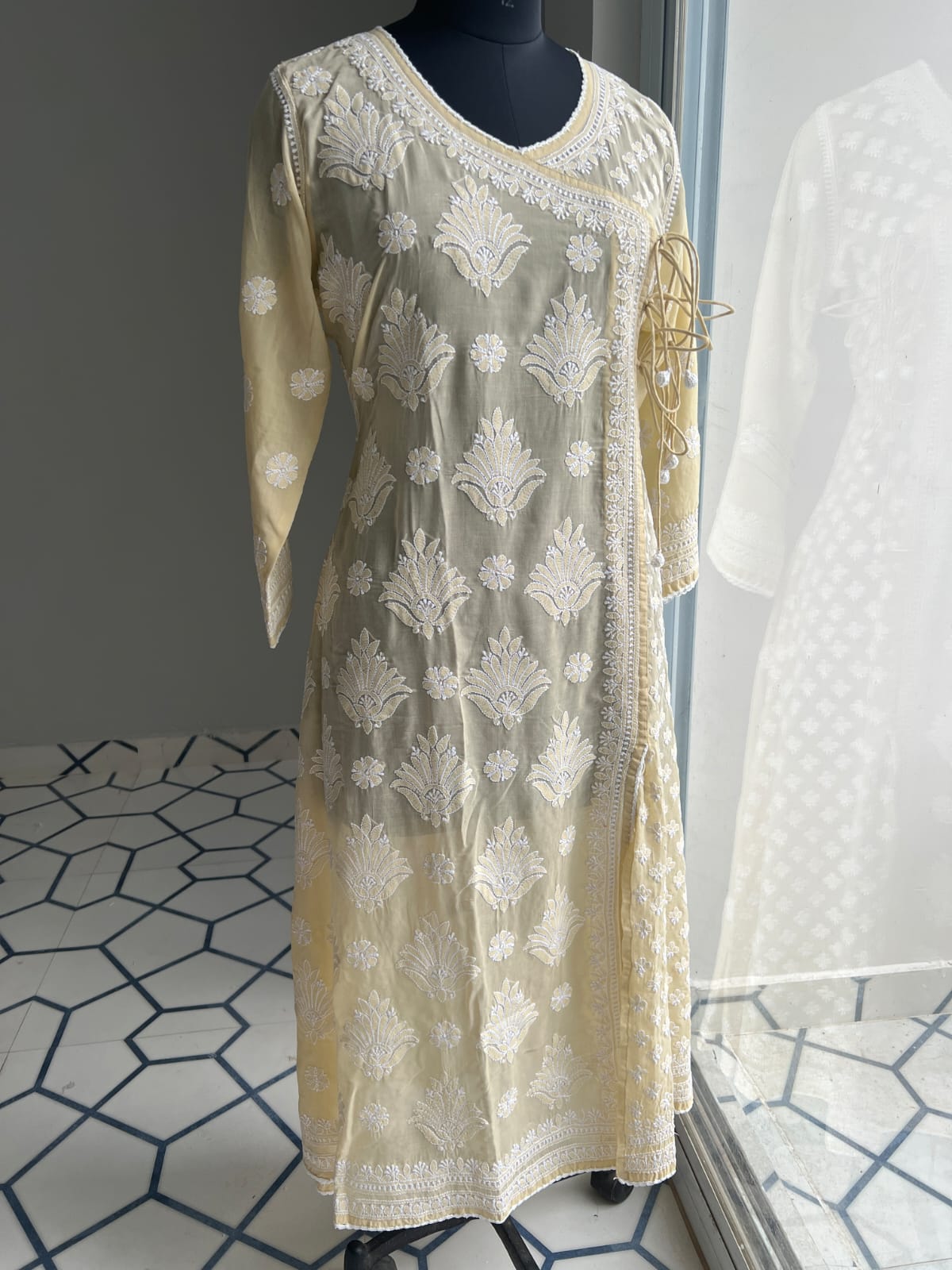 Beige A line Angarkha Style Kurti with chikankari and tessels
