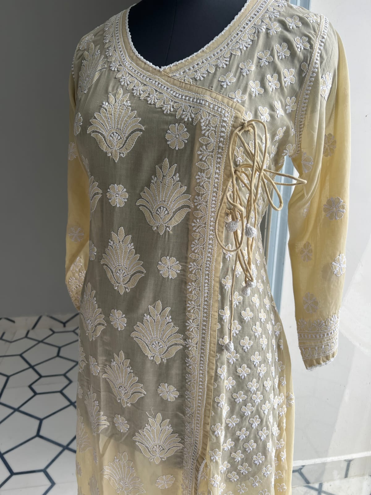 Beige A line Angarkha Style Kurti with chikankari and tessels