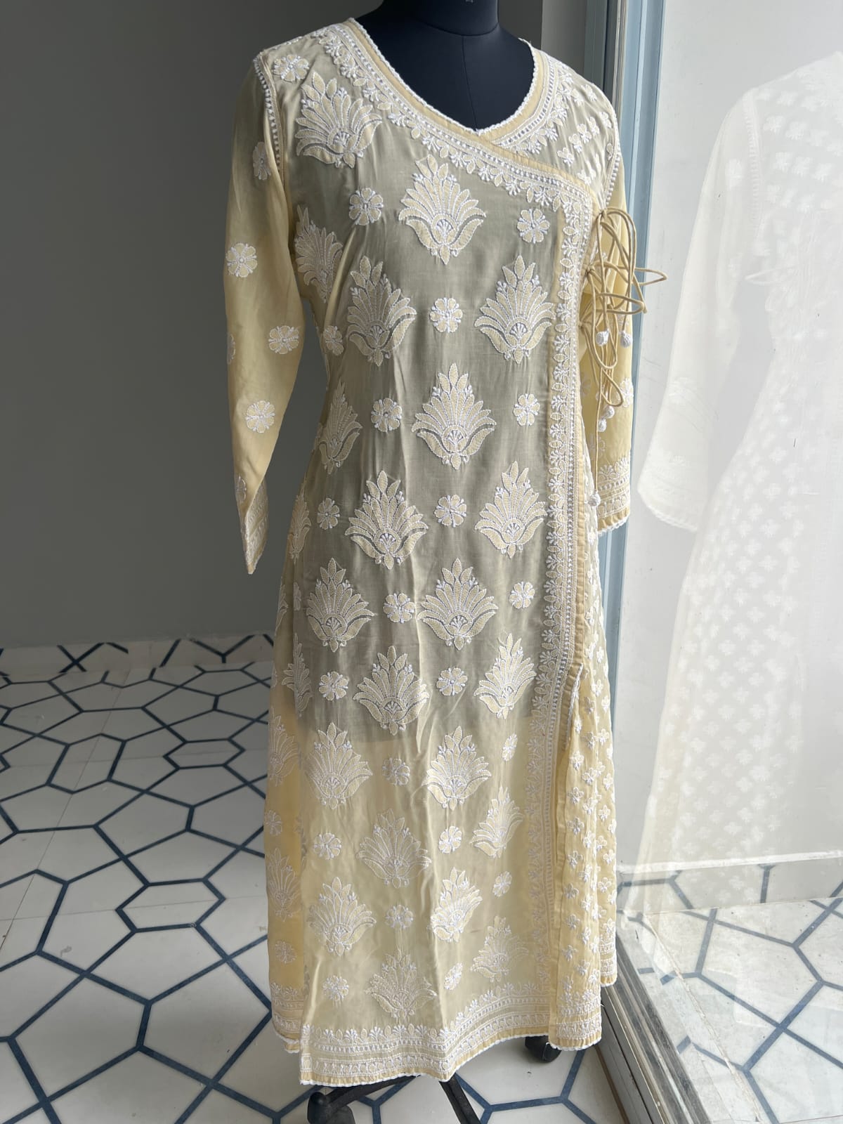 Beige A line Angarkha Style Kurti with chikankari and tessels