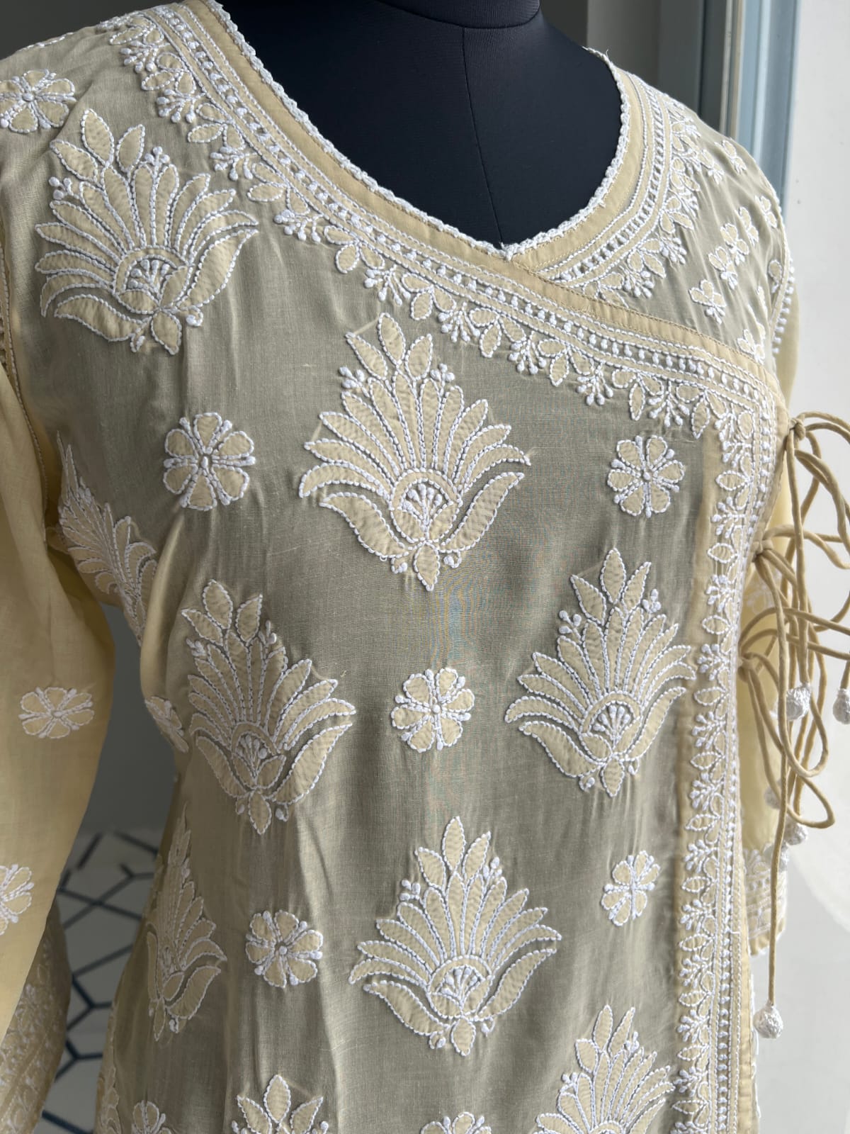 Beige A line Angarkha Style Kurti with chikankari and tessels