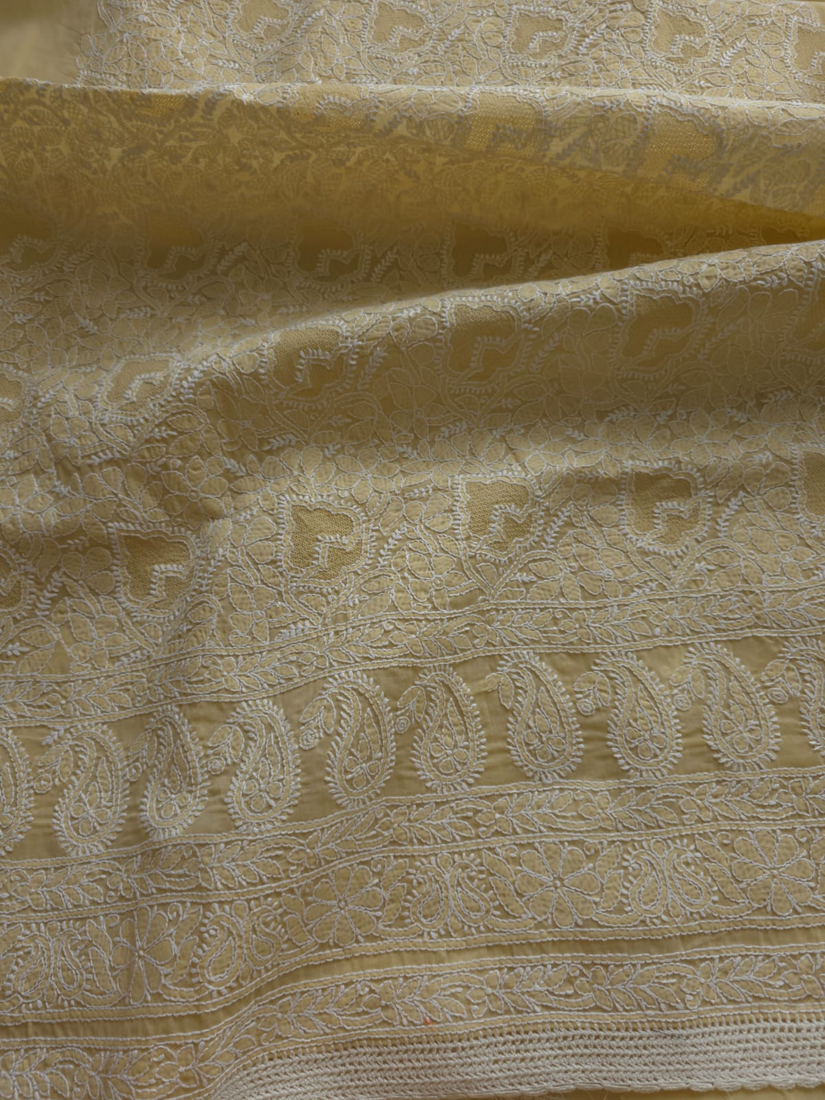 Beige Full suit with fine handwork and intricate Hand knitted Jaaliwork