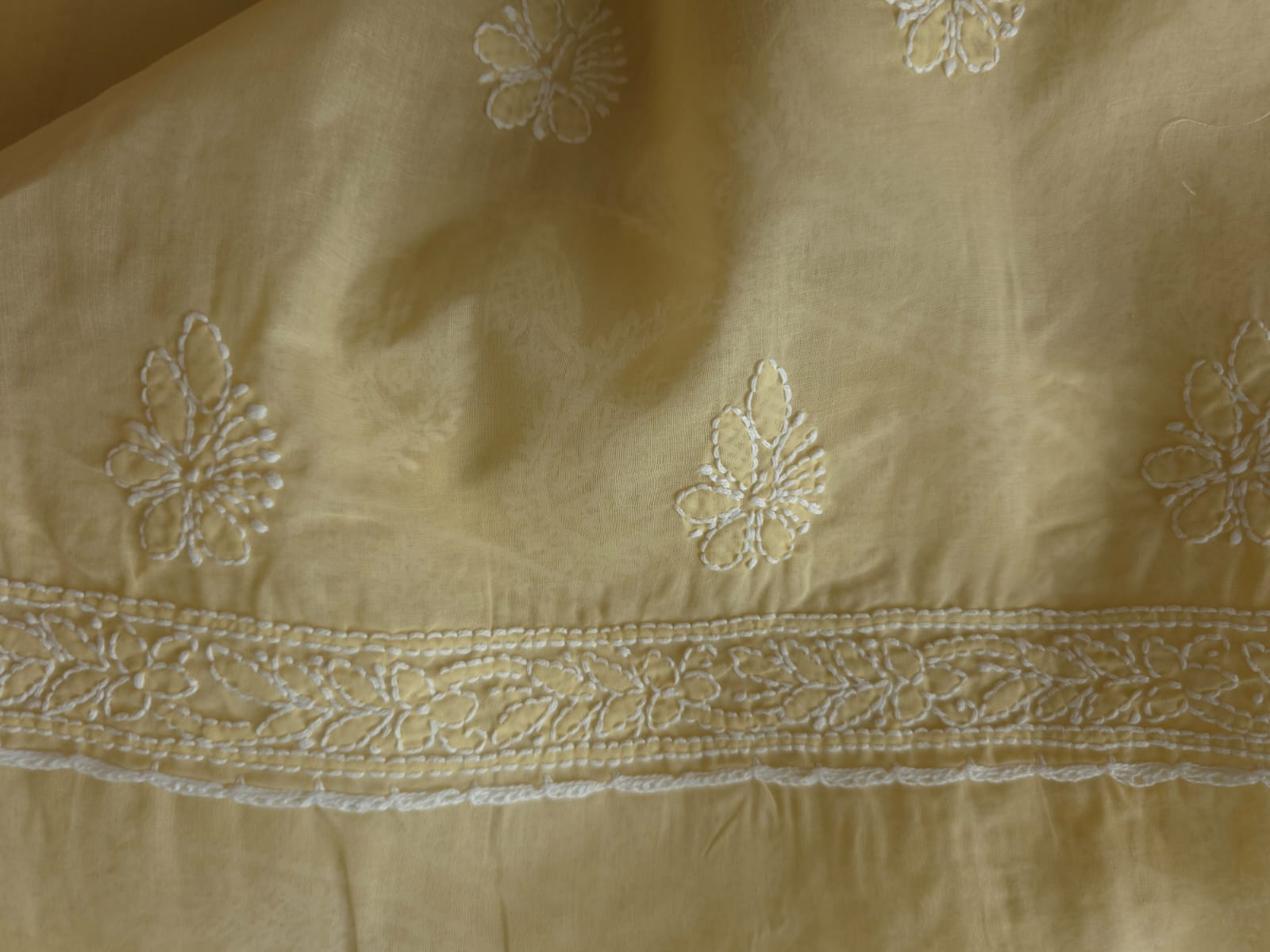 Beige Full suit with fine handwork and intricate Hand knitted Jaaliwork