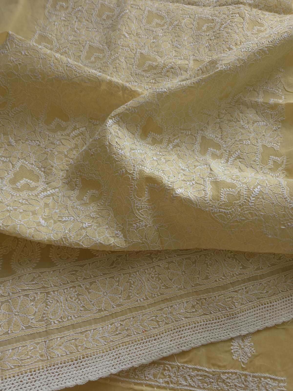 Beige Full suit with fine handwork and intricate Hand knitted Jaaliwork