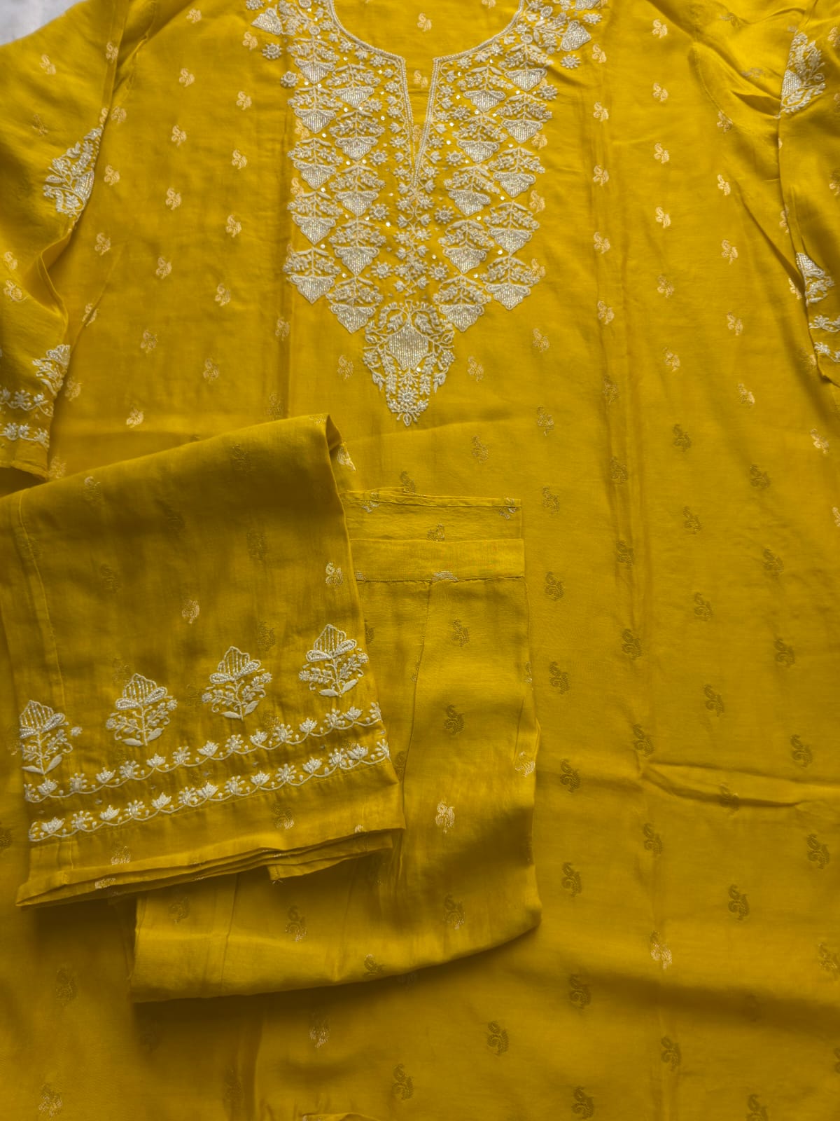 Golden yellow Chanderi silk so ord set with hand embroidery