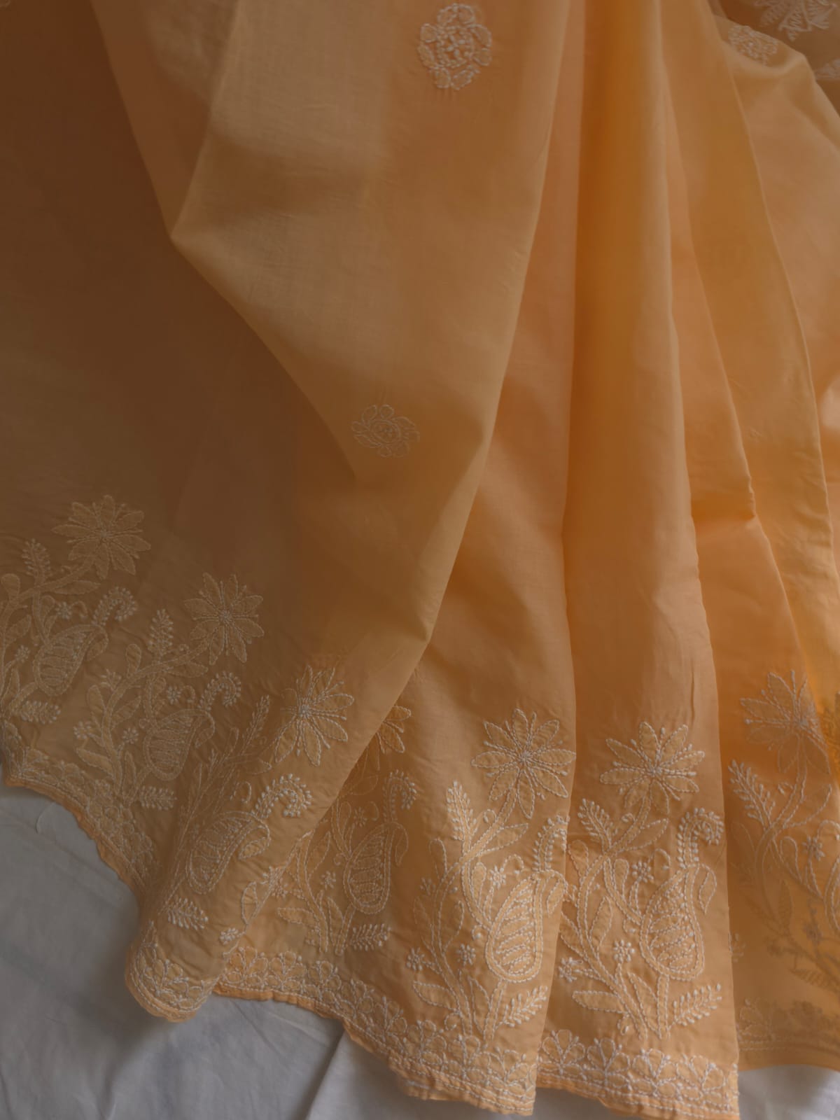 Orangish Peach Cotton saree with Skirt border and heavy Anchal