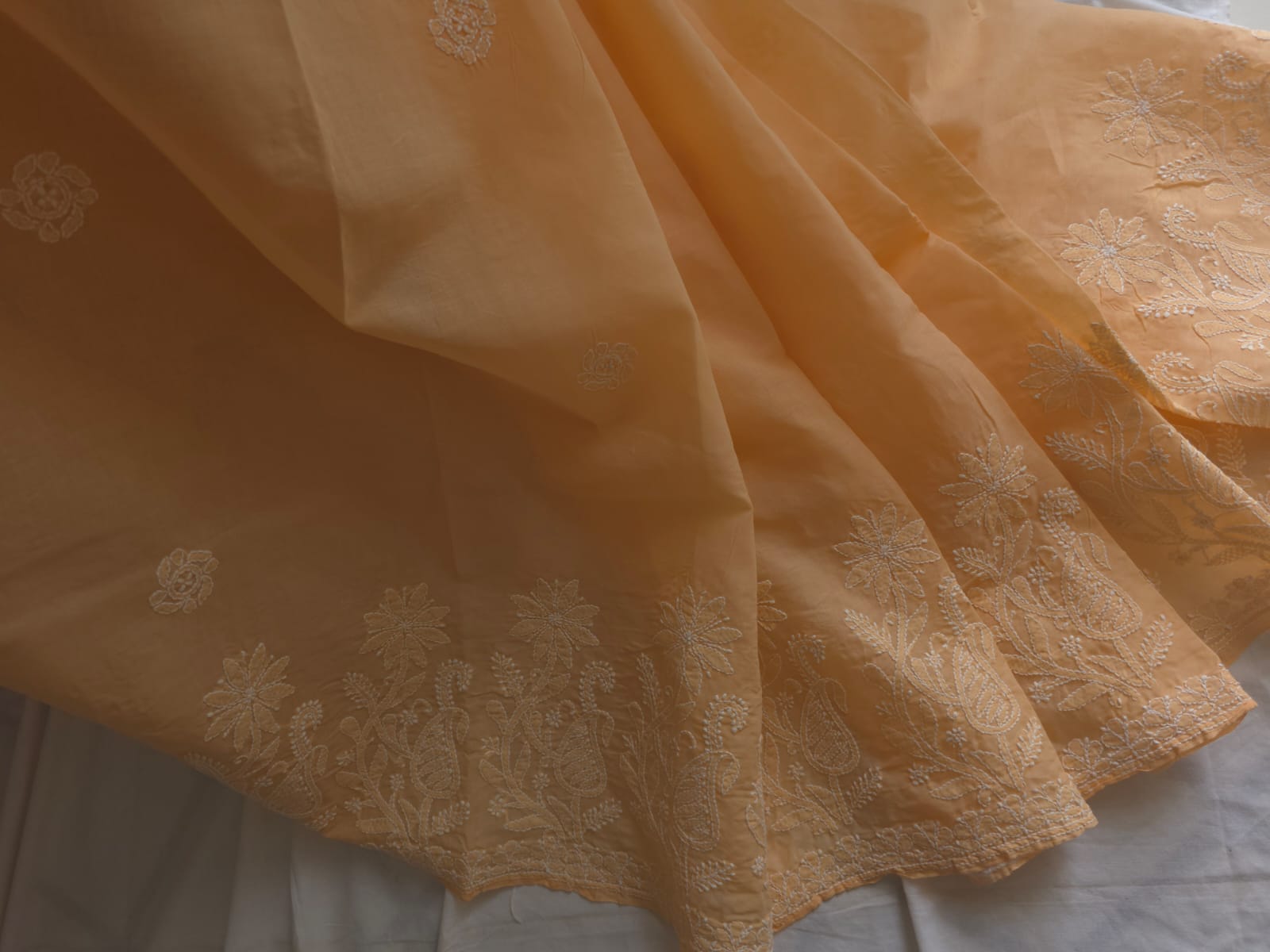 Orangish Peach Cotton saree with Skirt border and heavy Anchal