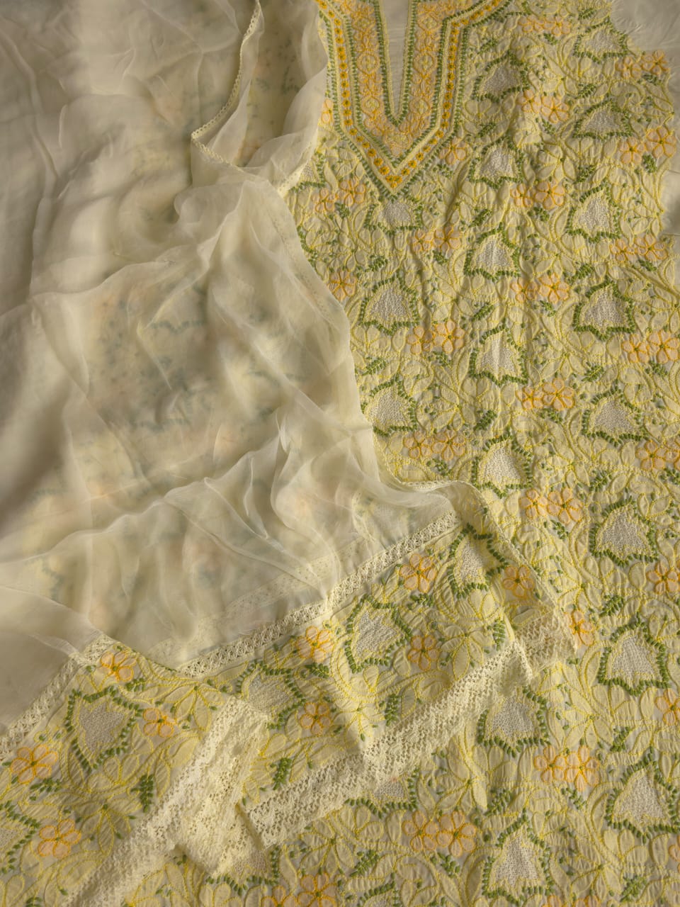 Creamy lemon color Designer cotton suit with contrast chikankari