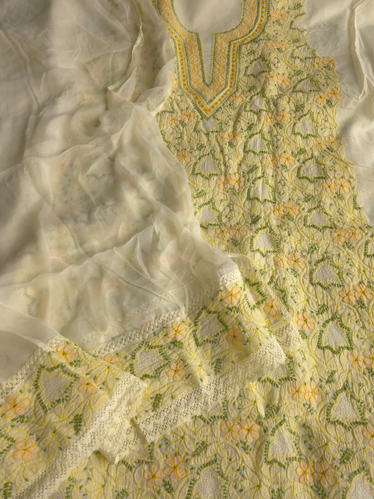 Creamy lemon color Designer cotton suit with contrast chikankari
