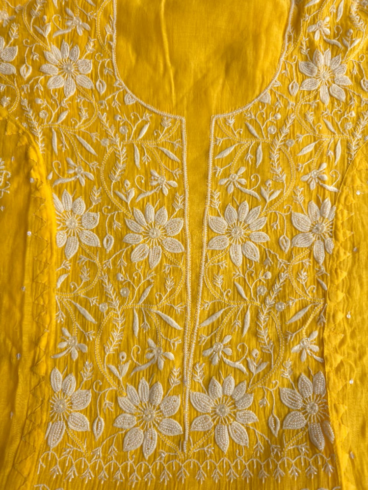 Image of Mango yellow Mul chanderi Kurta dupatta with intricate chikankari and add on