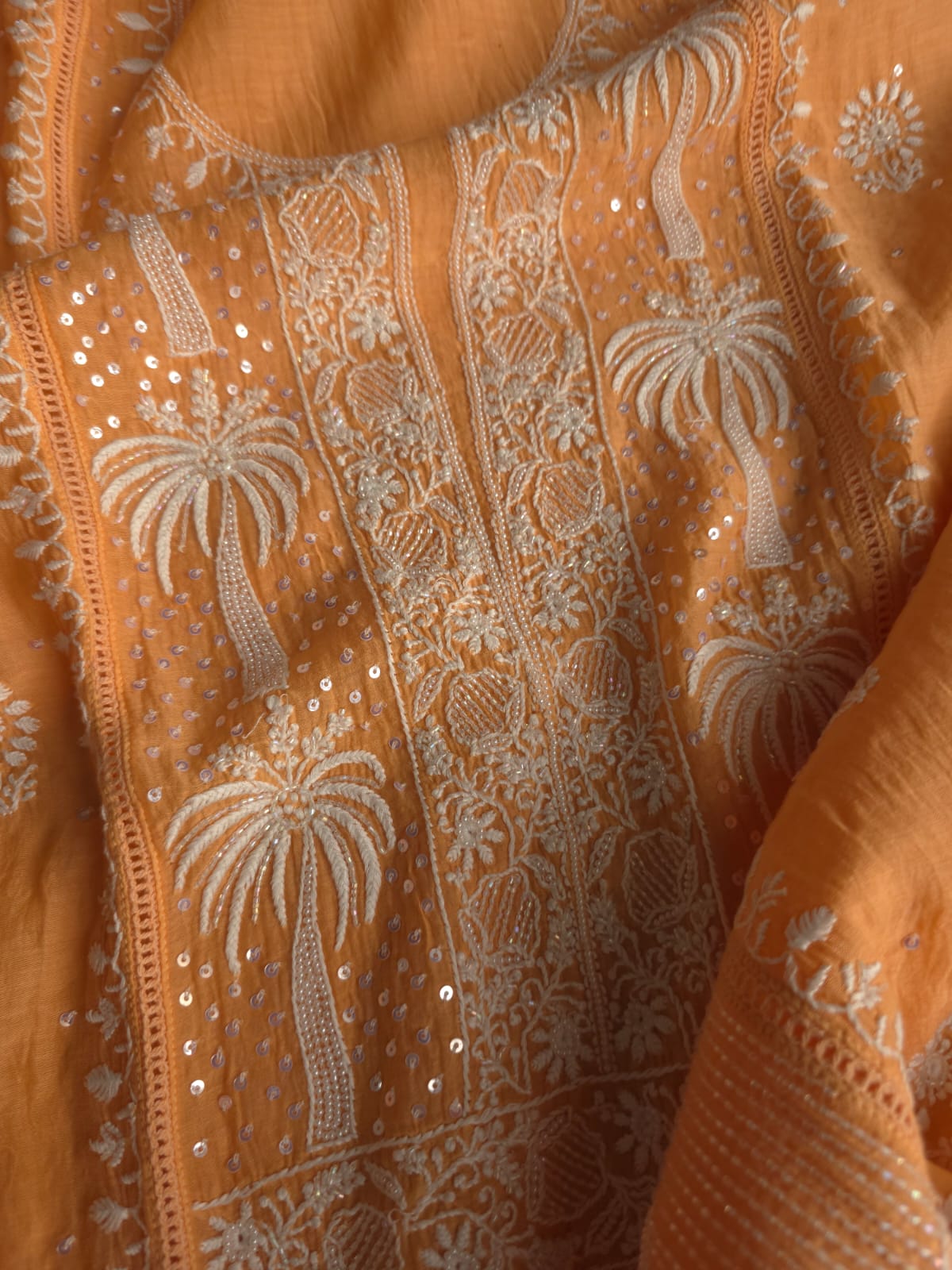 Light orange Mul chanderi Kurta dupatta with fine handwork