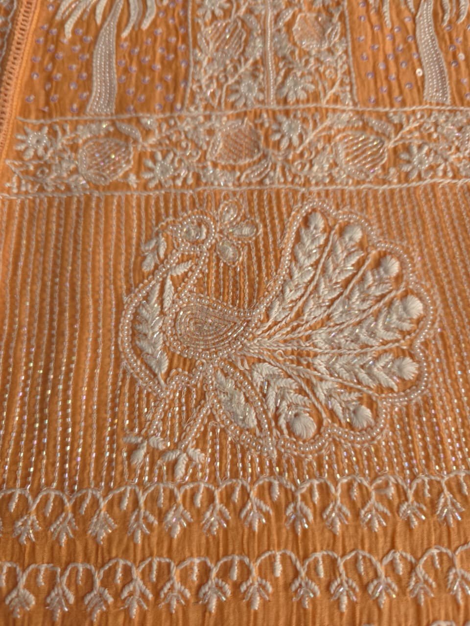 Light orange Mul chanderi Kurta dupatta with fine handwork
