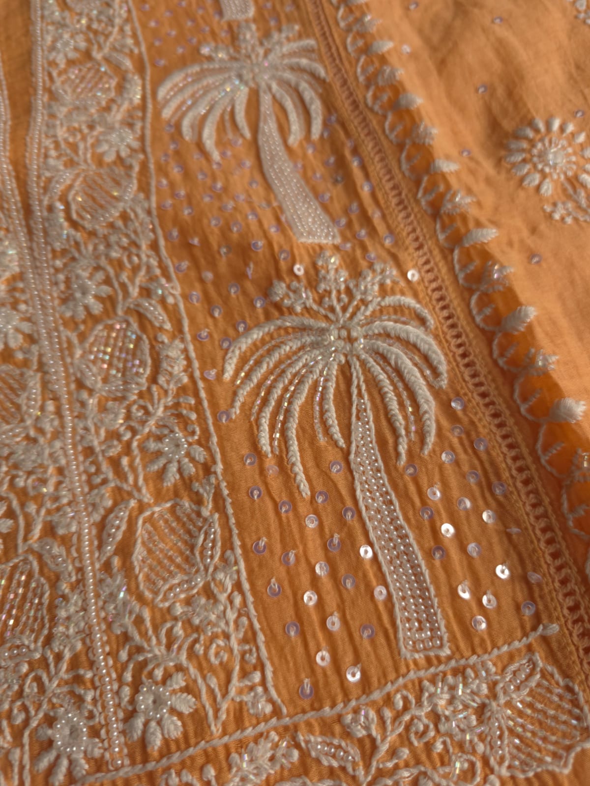 Light orange Mul chanderi Kurta dupatta with fine handwork
