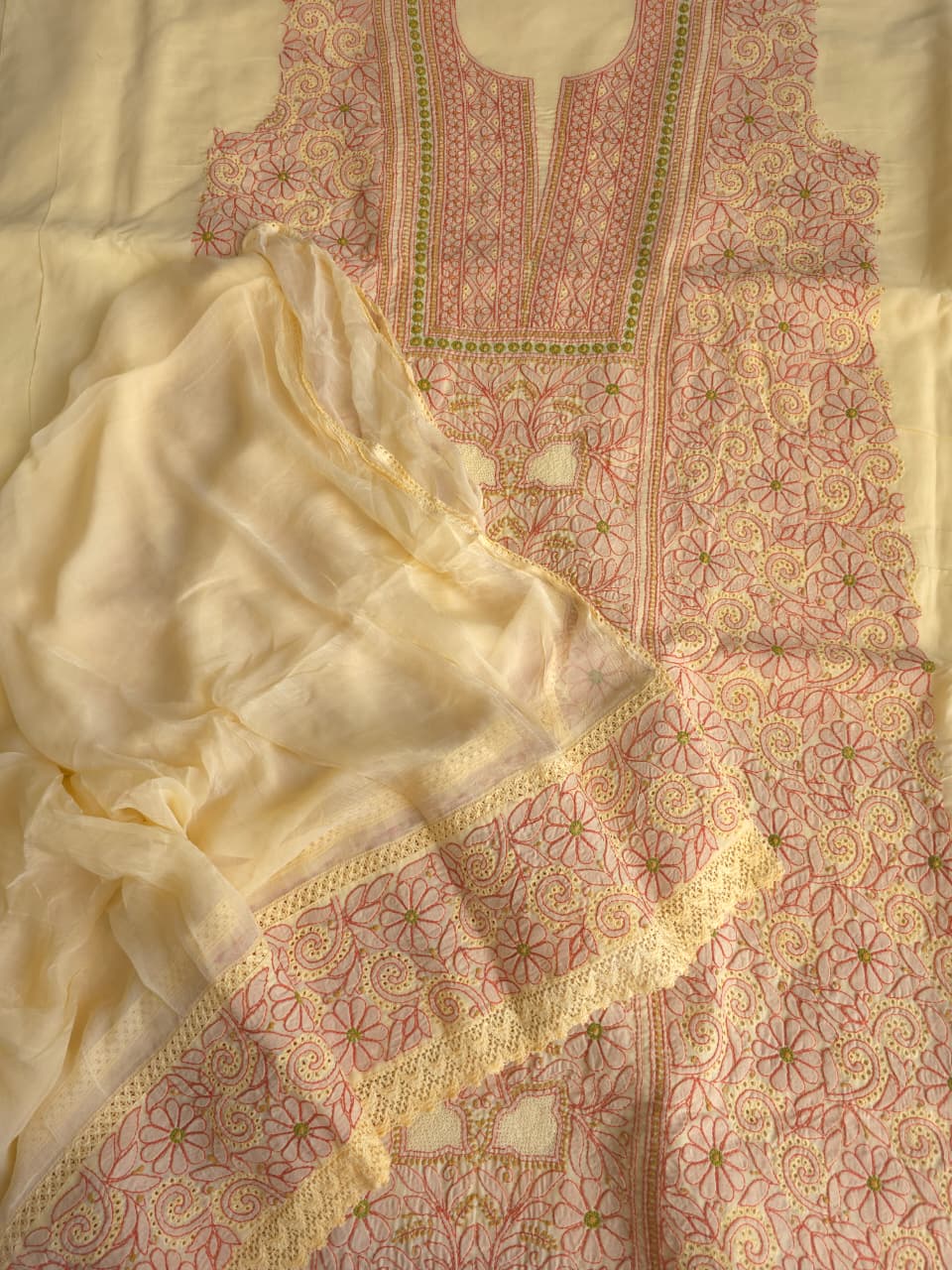Beigish yellow Cotton premium suit with fine contrast chikankari and Jaaliwork
