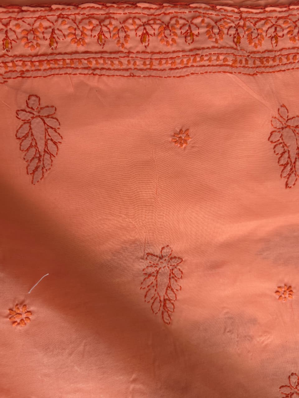 Orange Rust combination cotton suit with chikanakri and embellishments