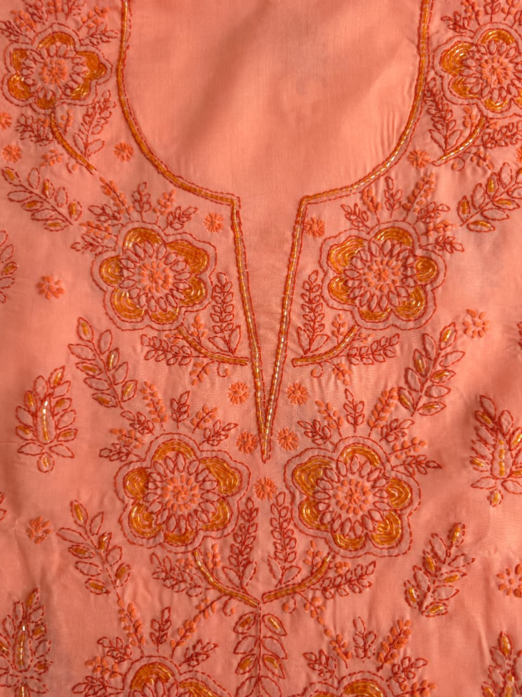 Image of Orange &amp; Rust combination cotton suit with chikanakri and embellishments