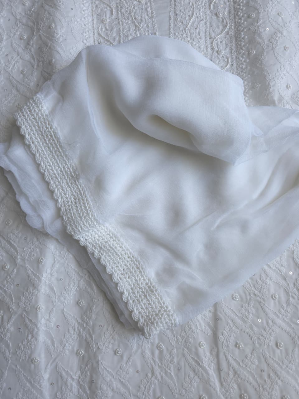 Full white cotton suit with suoerfine chikankari and embellishments