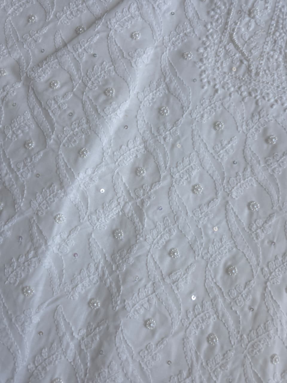 Full white cotton suit with suoerfine chikankari and embellishments