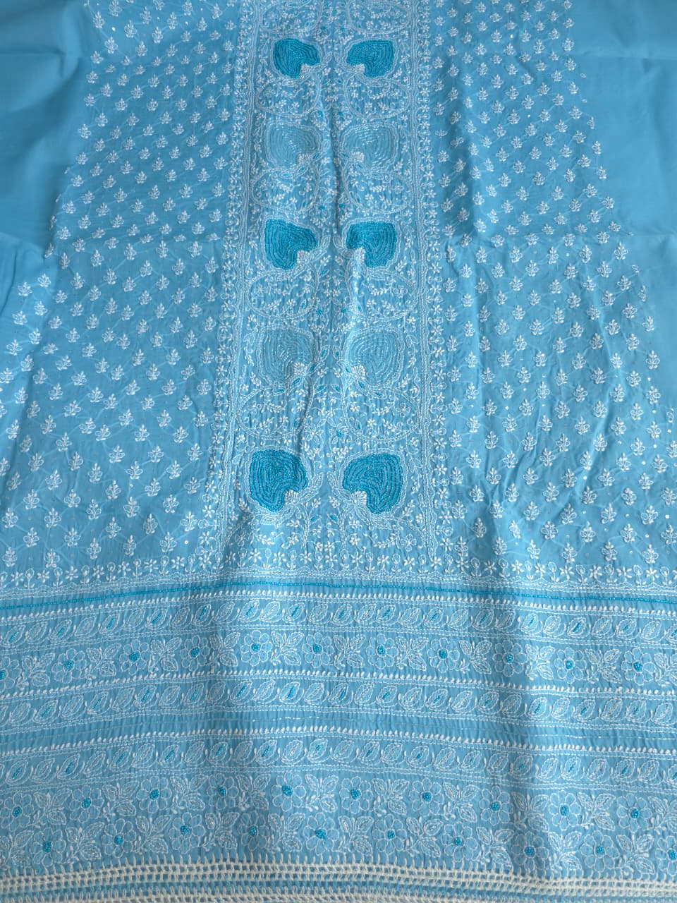 Blue Cotton full set with fine chikankari and heavy embellishments