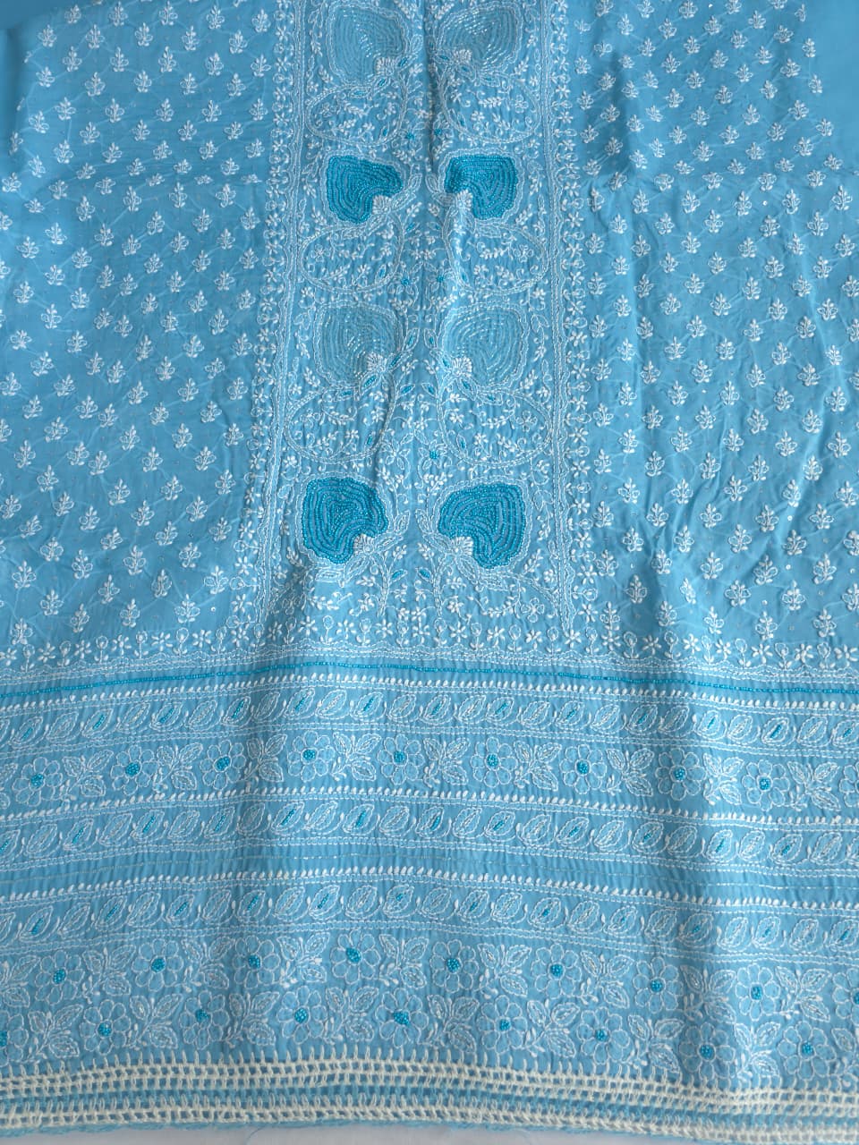 Blue Cotton full set with fine chikankari and heavy embellishments