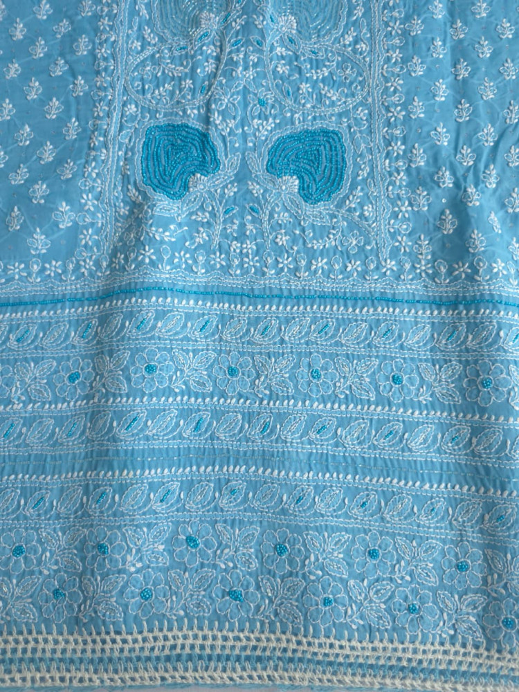 Image of Blue Cotton full set with fine chikankari and heavy embellishments