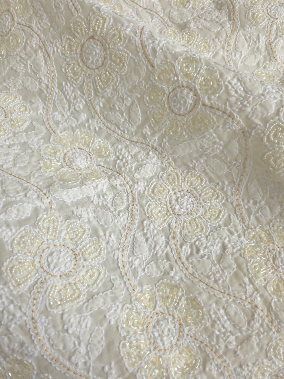 Cream color cotton full suit with fine chikankari and embellishments
