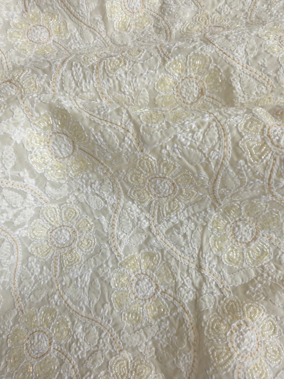 Cream color cotton full suit with fine chikankari and embellishments