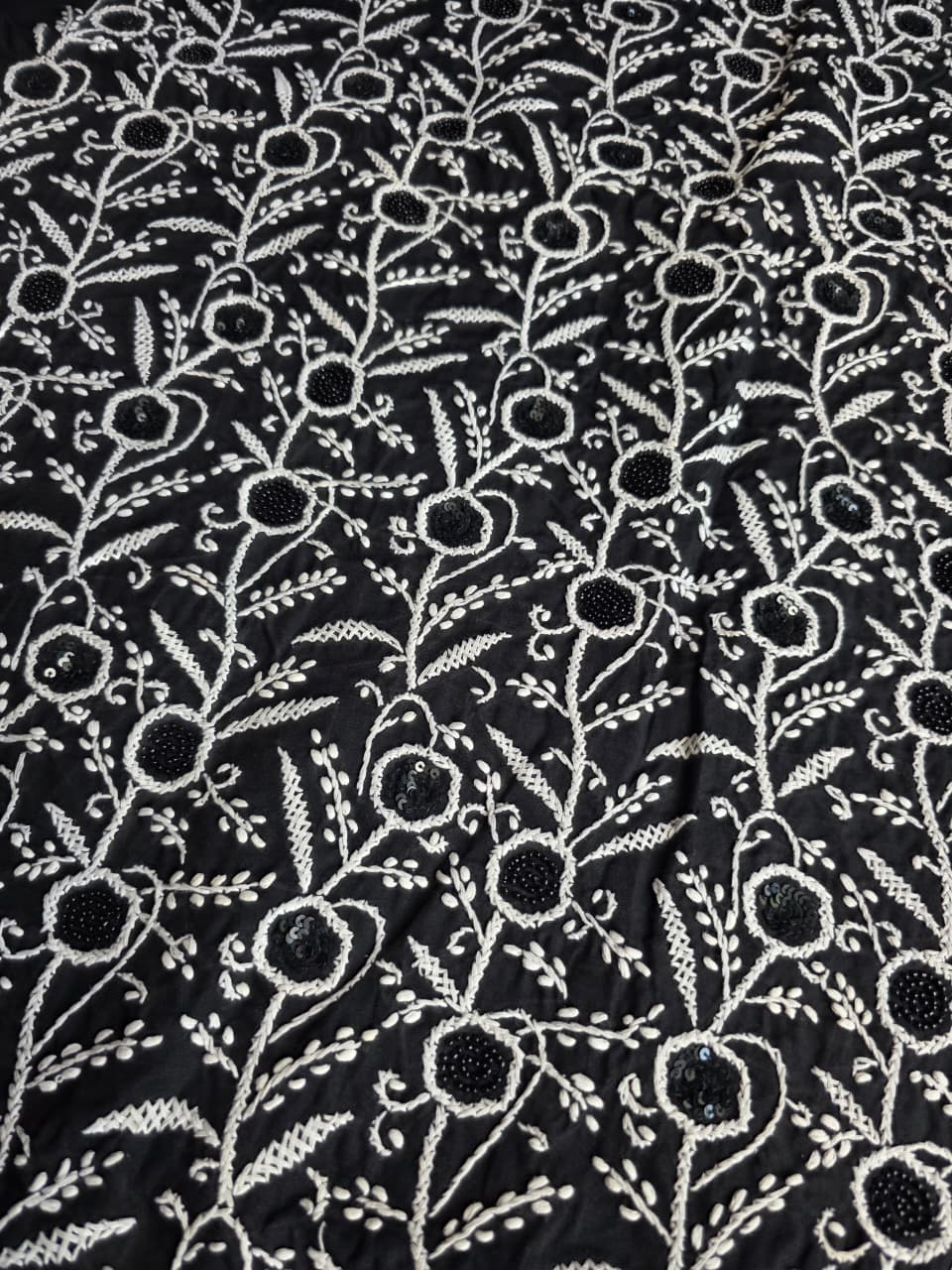 Black cotton kurta fabric with white chikankari and embellishments