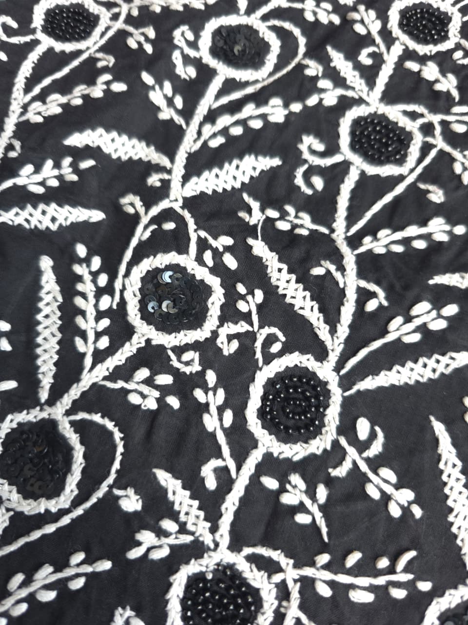 Black cotton kurta fabric with white chikankari and embellishments