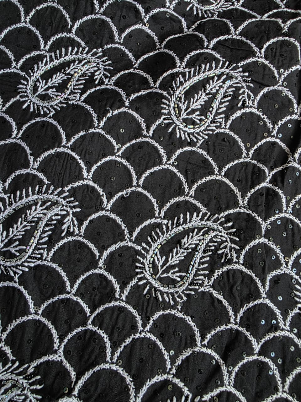 Black cotton kurta fabric with white cihikankari and embellishments