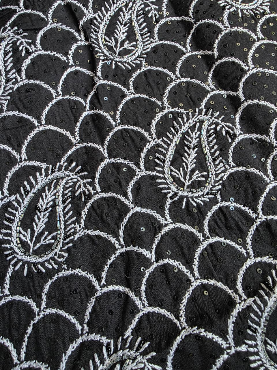 Black cotton kurta fabric with white cihikankari and embellishments