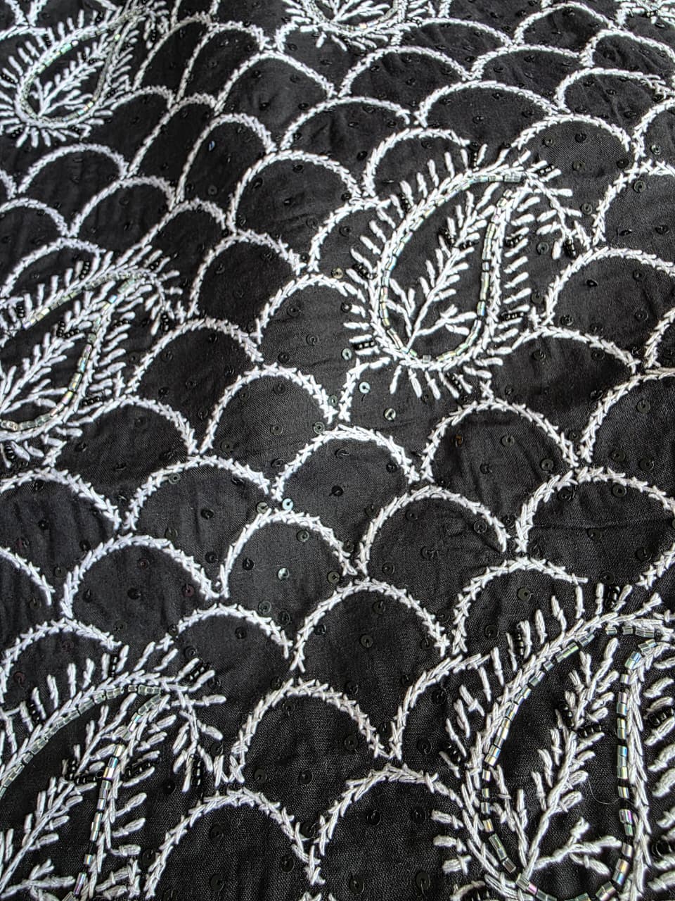 Black cotton kurta fabric with white cihikankari and embellishments
