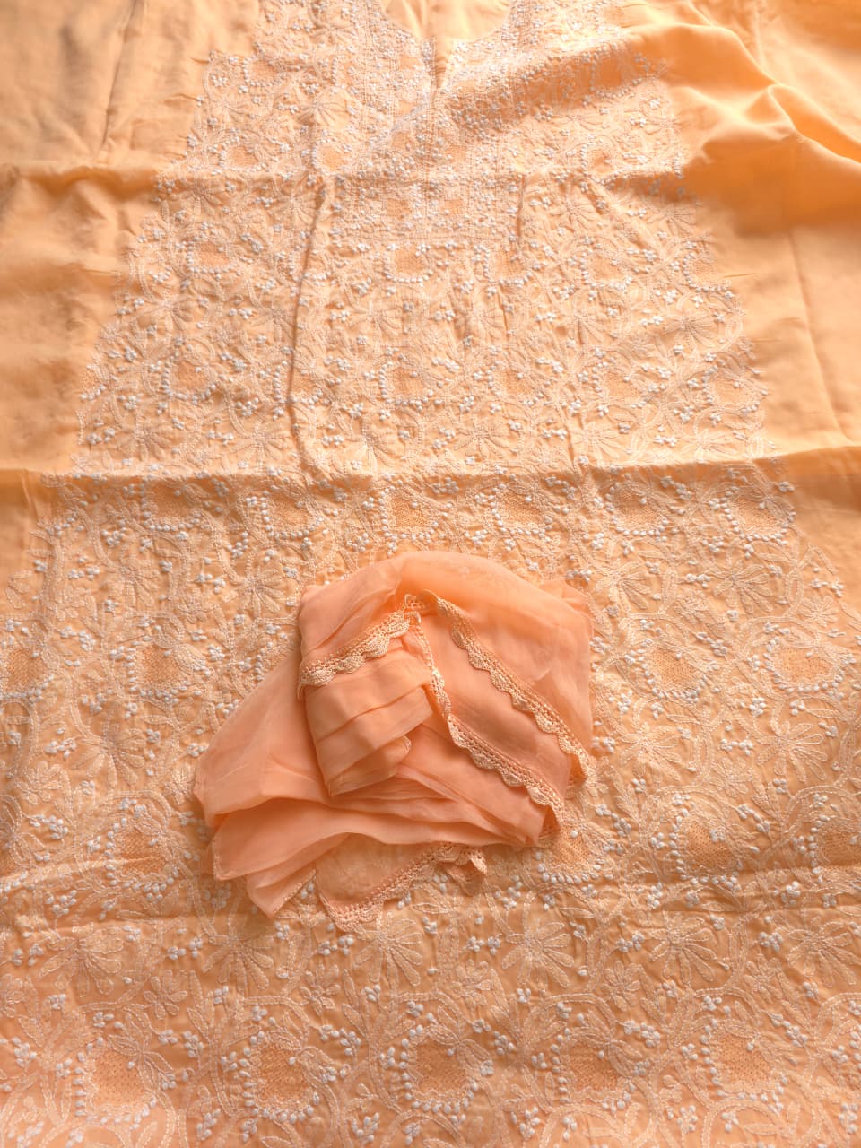 Peach cotton suit with fine handwork and jaaliwork