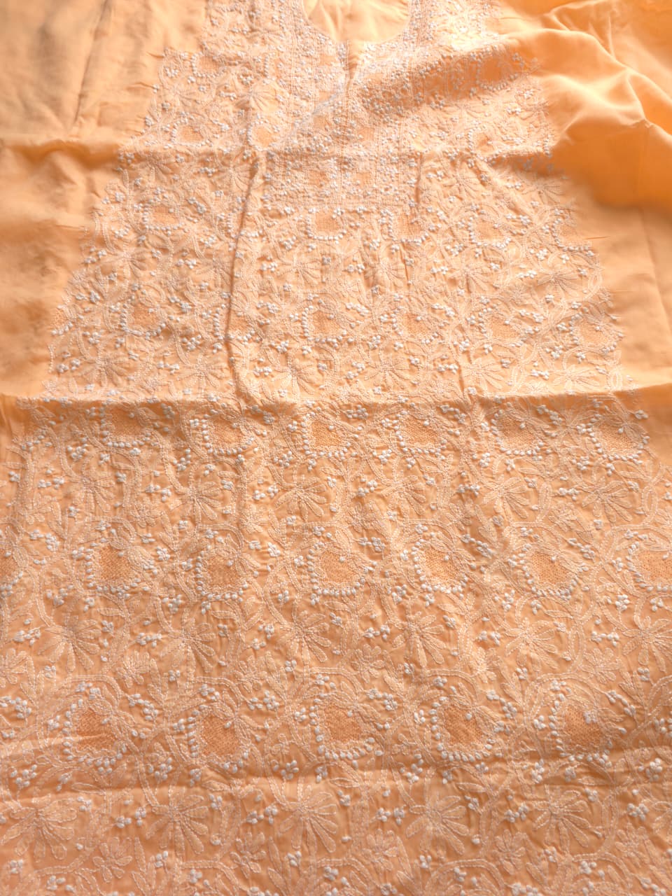 Peach cotton suit with fine handwork and jaaliwork