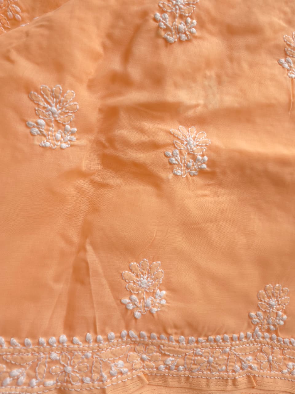 Peach cotton suit with fine handwork and jaaliwork
