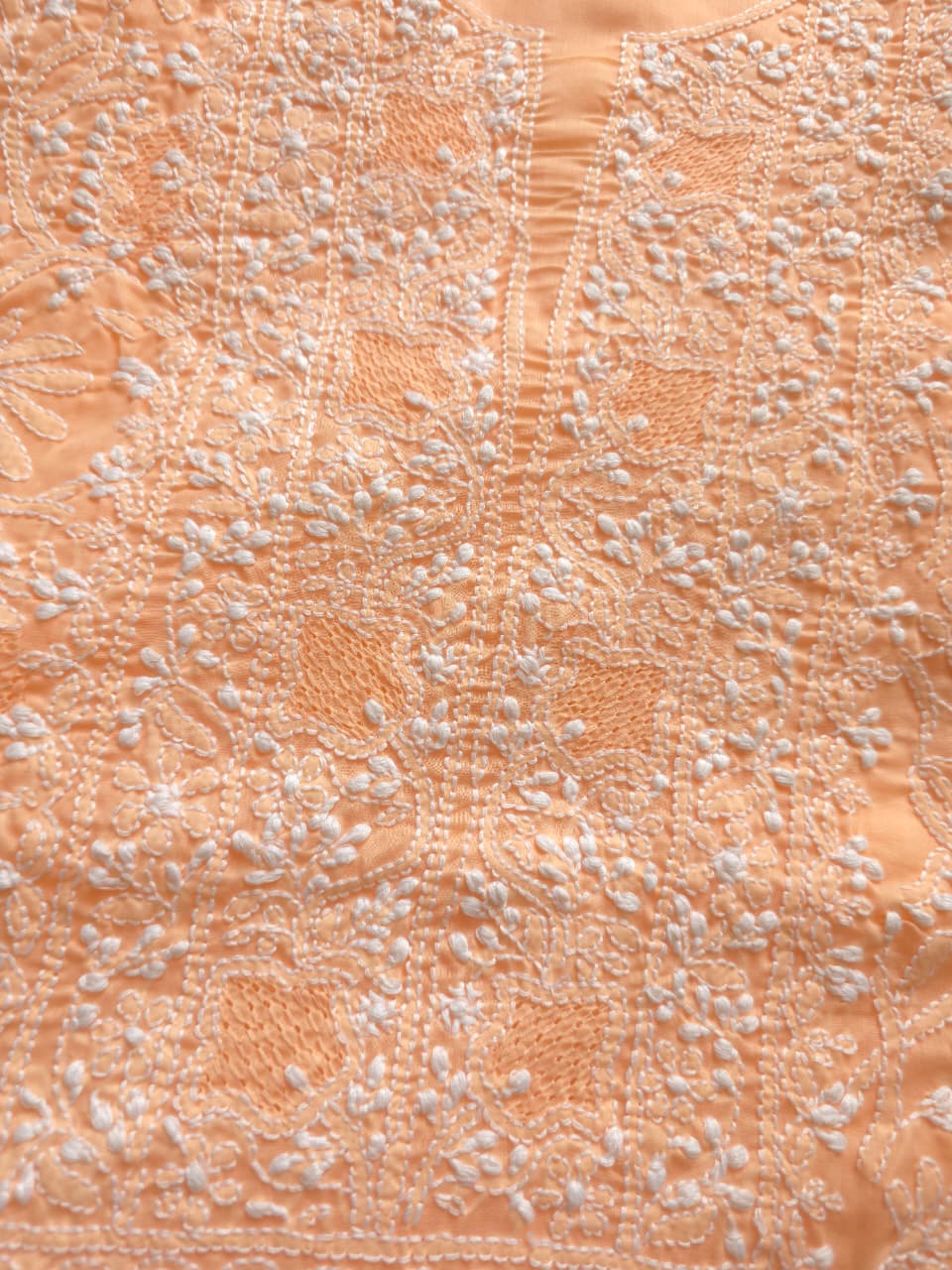 Peach cotton suit with fine handwork and jaaliwork