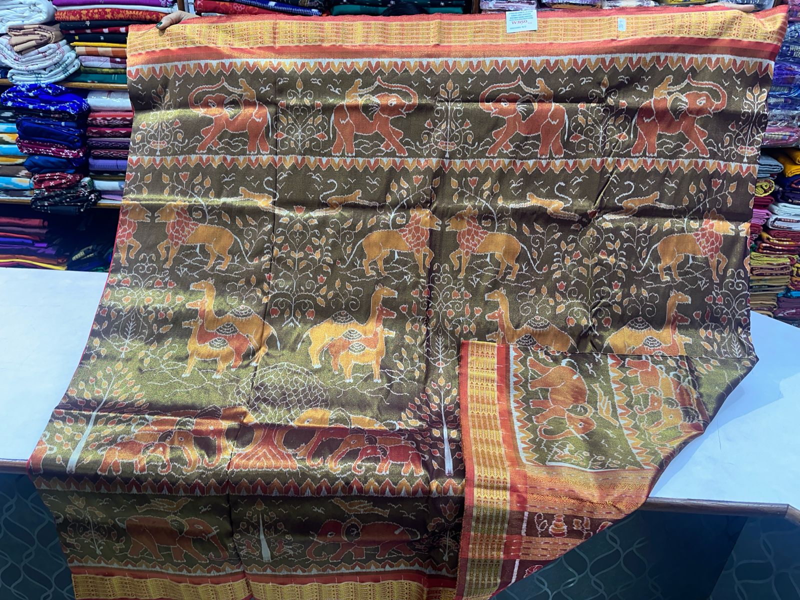 Deep green and Red sambalpuri tissue silk saree