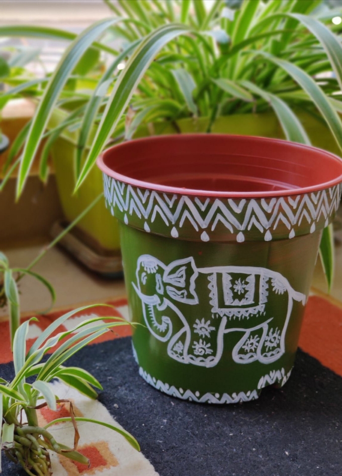 Green and white hand painted planter