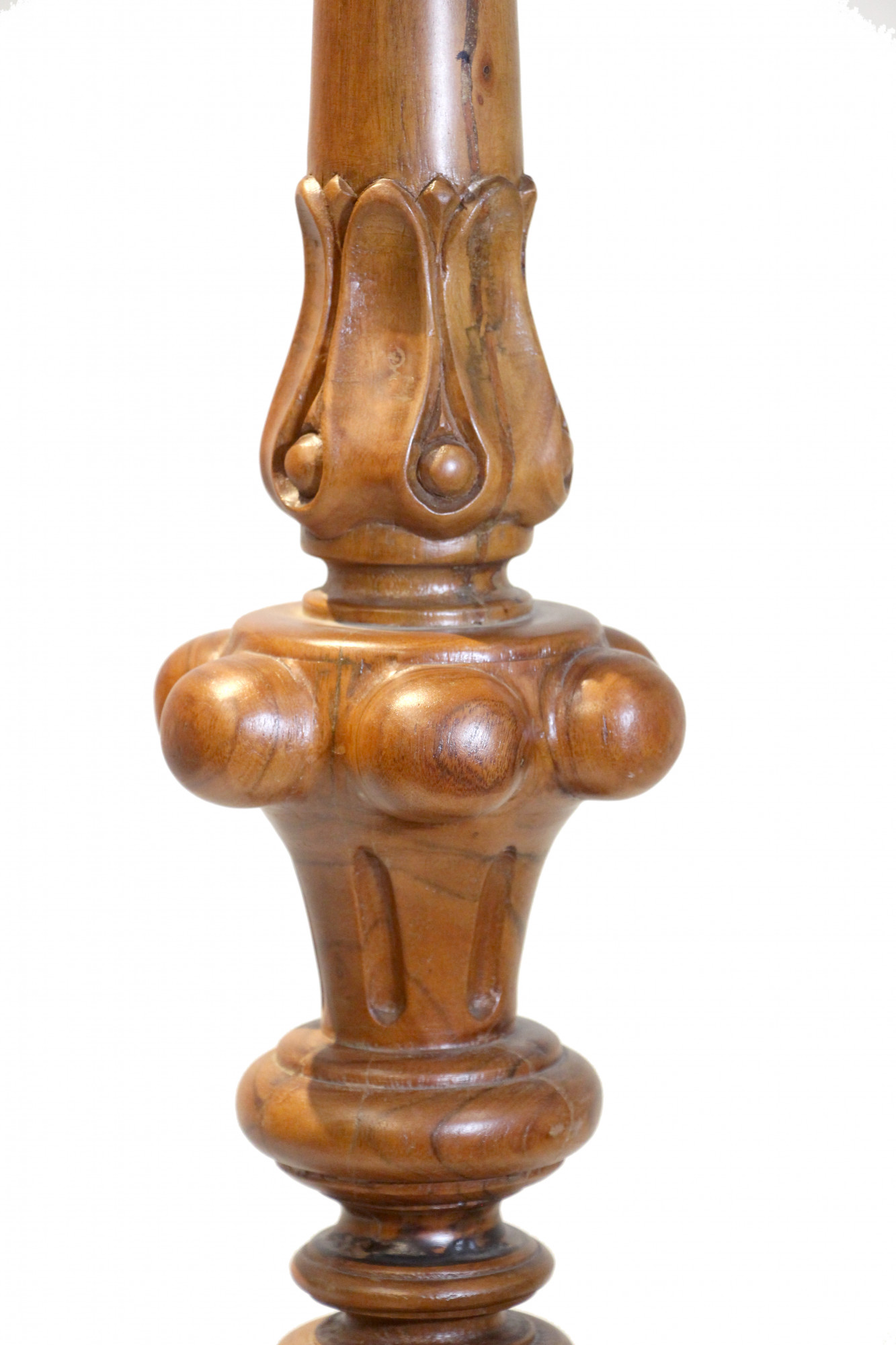 Carved wooden candle stand