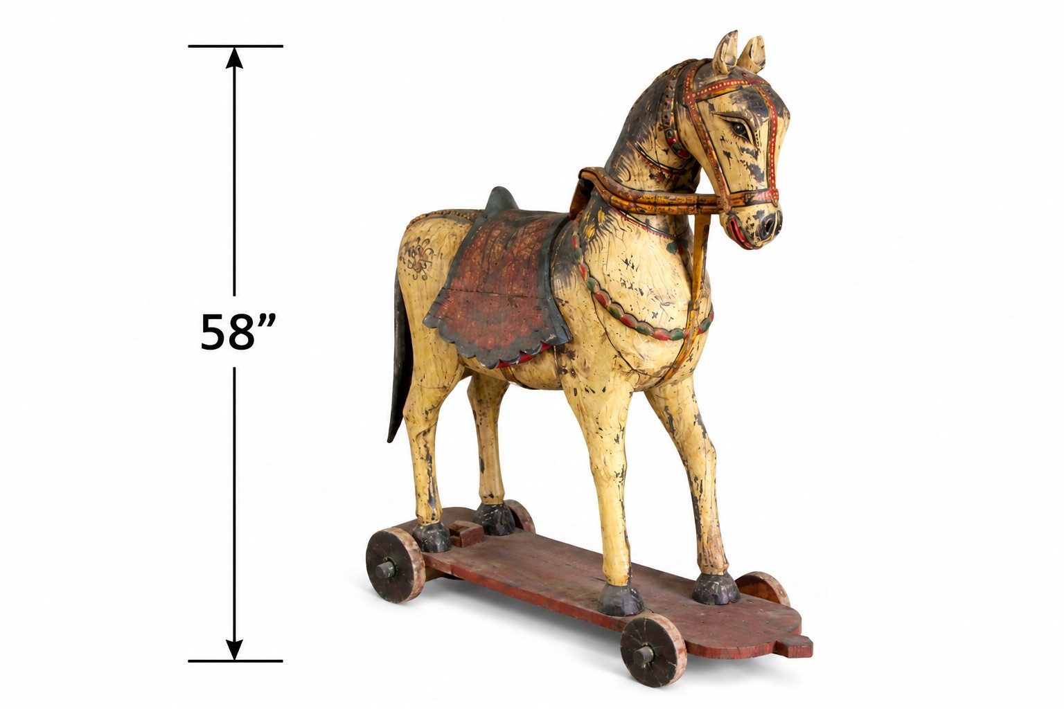 Vintage wooden horse on wheels