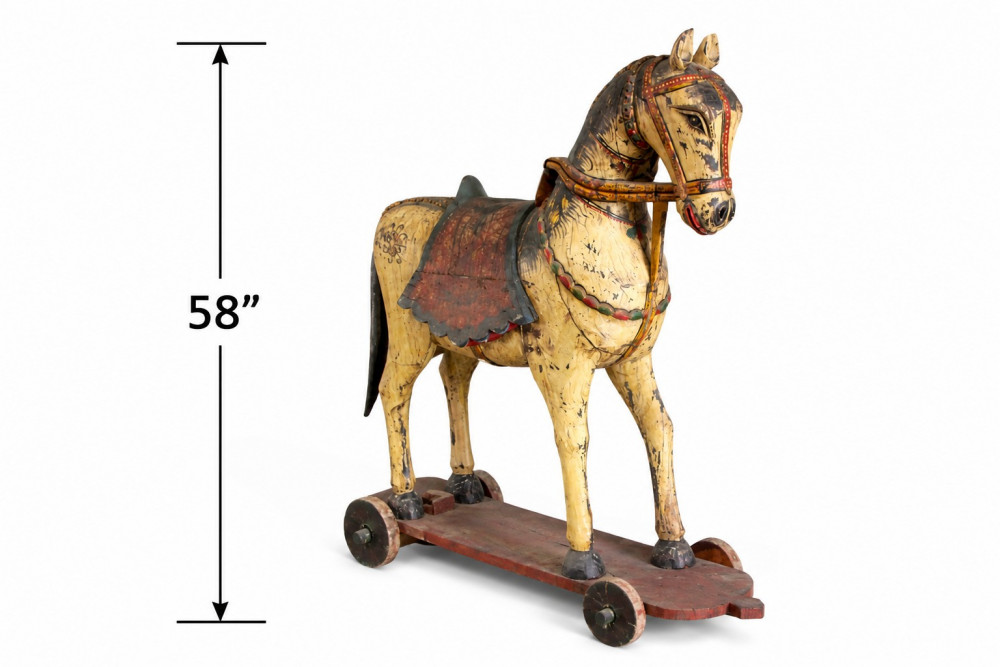 Image of Vintage wooden horse on wheels