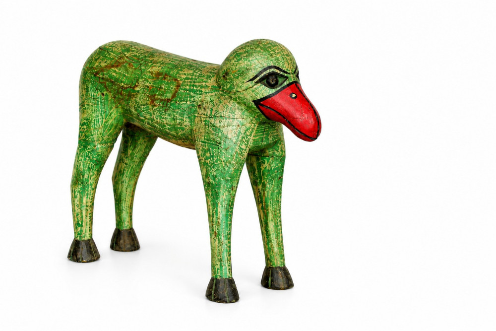 Image of Vintage hand carved wooden figurine
