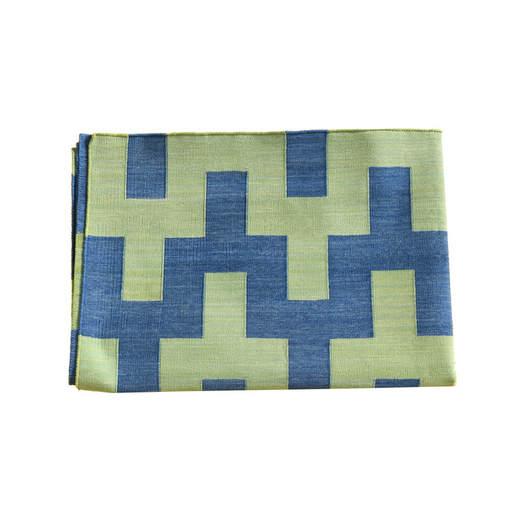 Geometric blue and green rug