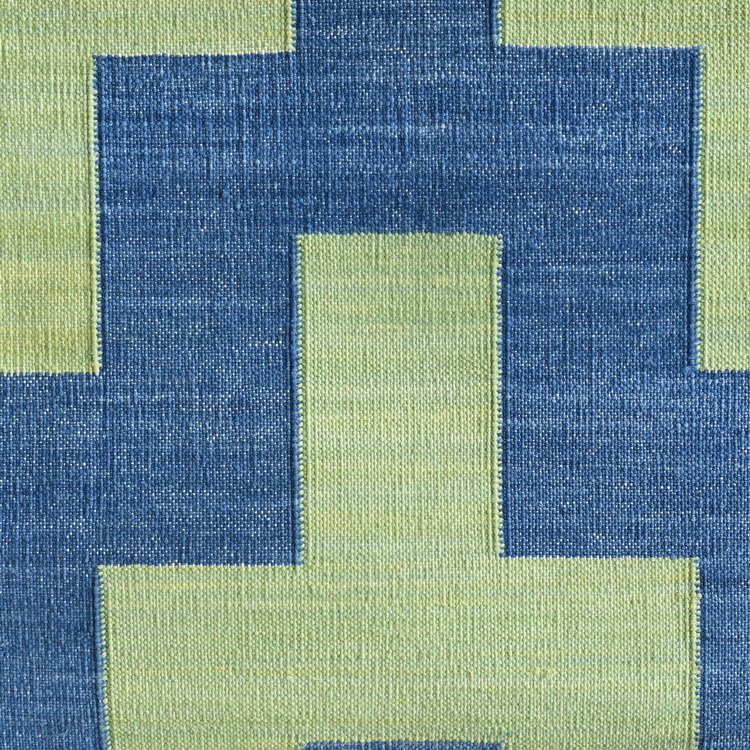 Geometric blue and green rug
